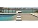 Gorgeous backyard features a pristine pool, with spa and picturesque waterfront views at 7974 1St S Ave, St Petersburg, FL 33707