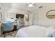 Bright bedroom with ceiling fan, desk space, and TV for comfort at 854 Harbor Is, Clearwater, FL 33767