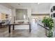 Elegant foyer featuring stylish decor, tile flooring, and a seamless transition to the dining and living areas at 854 Harbor Is, Clearwater, FL 33767