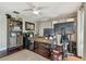 Well-lit home office with custom desk, hardwood floors, and ample storage space at 854 Harbor Is, Clearwater, FL 33767