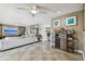 Spacious living area featuring tile floors, a bar area, and open layout, great for socializing and entertaining at 854 Harbor Is, Clearwater, FL 33767