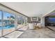 Bright living room with water views, featuring comfortable seating and an open layout, ideal for entertaining at 854 Harbor Is, Clearwater, FL 33767