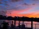 Beautiful pink and orange sunset view over the water from the patio at 854 Harbor Is, Clearwater, FL 33767