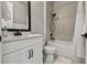 Well-lit bathroom with a shower-tub combination, modern fixtures, and a stylish vanity with sink at 8960 Windlass Cv, Parrish, FL 34219