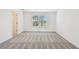 Spacious bedroom with neutral carpet and natural light from the double windows at 10520 Hidden Banks Gln, Parrish, FL 34219