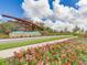 Beautiful community entrance with landscaping and attractive architectural design at 10628 Bahama Woodstar Ct, Riverview, FL 33579