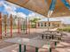 Playground and picnic tables next to the community center with a vibrant playset and picnic area at 10628 Bahama Woodstar Ct, Riverview, FL 33579