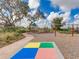 Community playground with swings, seating, and a colorful play area for children at 10628 Bahama Woodstar Ct, Riverview, FL 33579