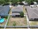 Aerial view of a neighborhood with fenced-in backyards and mature trees at 11136 Hartford Fern Dr, Riverview, FL 33569