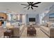 Open-concept living room with hardwood floors and an inviting atmosphere at 11136 Hartford Fern Dr, Riverview, FL 33569