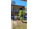 Inviting two-story condo with green lawn and manicured tropical landscaping at 11411 Pike Ct # 6, New Port Richey, FL 34654