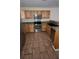 Functional kitchen features stainless steel appliances and ample countertop space at 11411 Pike Ct # 6, New Port Richey, FL 34654