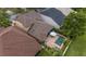 Overhead view of backyard pool with lounge area, patio, and well-maintained landscaping at 11607 Meridian Point Dr, Tampa, FL 33626