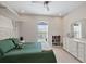 Bright bedroom with stylish white furniture, soft neutral carpet, and lots of light at 11607 Meridian Point Dr, Tampa, FL 33626