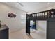 Bright bedroom with a unique loft bed and a desk below, perfect for a student at 11607 Meridian Point Dr, Tampa, FL 33626