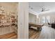 View of a bonus room featuring a large pantry, hardwood floors, and a ceiling fan at 11607 Meridian Point Dr, Tampa, FL 33626