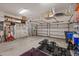 Spacious garage with ample storage, multiple doors, and potential for a home gym at 11607 Meridian Point Dr, Tampa, FL 33626
