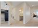 Hallway featuring a view of a bathroom and a bedroom at 11607 Meridian Point Dr, Tampa, FL 33626