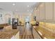 Spacious kitchen featuring stainless steel appliances, granite countertops, hardwood floors, and an island at 11607 Meridian Point Dr, Tampa, FL 33626