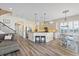 A spacious kitchen features an island with bar seating, stainless appliances, and a charming dining area at 11607 Meridian Point Dr, Tampa, FL 33626