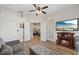 Inviting living space with fireplace, television, and view into the adjacent rooms at 11607 Meridian Point Dr, Tampa, FL 33626