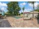 A backyard pool and seating, perfect for warm days and relaxation at 11607 Meridian Point Dr, Tampa, FL 33626