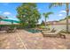 A backyard pool and seating, perfect for warm days and relaxation at 11607 Meridian Point Dr, Tampa, FL 33626