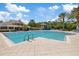 Large outdoor swimming pool with lap lanes and surrounding lounge area at 11607 Meridian Point Dr, Tampa, FL 33626
