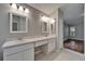 Bathroom featuring double sinks, vanity and tile flooring at 11626 Pure Pebble Dr, Riverview, FL 33569