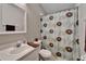 Full bathroom featuring neutral walls, a shower and bathtub combo, and a white vanity at 11626 Pure Pebble Dr, Riverview, FL 33569