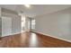Spacious bedroom featuring wood flooring and an attached bathroom for convenience at 11626 Pure Pebble Dr, Riverview, FL 33569