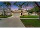 Charming single-Gathering home with a well-manicured lawn, driveway, and attached garage at 11626 Pure Pebble Dr, Riverview, FL 33569