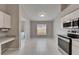 Kitchen with modern appliances and eat-in area at 11626 Pure Pebble Dr, Riverview, FL 33569