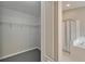 Walk-in closet with shelving and carpet flooring at 11626 Pure Pebble Dr, Riverview, FL 33569