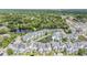Overhead view of a lakeside community with lush landscaping, water features and community pool at 12233 Armenia Gables Cir # 12233, Tampa, FL 33612
