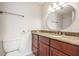 Bathroom featuring granite countertop and updated mirror at 12233 Armenia Gables Cir # 12233, Tampa, FL 33612