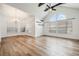 Living room with vaulted ceilings, large arched window and plenty of light at 12233 Armenia Gables Cir # 12233, Tampa, FL 33612