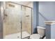 Shower with glass door and tile shower at 14323 Easy Goer St, Ruskin, FL 33573