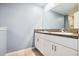 Bathroom with dual sinks and granite counters at 14323 Easy Goer St, Ruskin, FL 33573