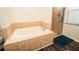 Soaking tub with tile surround and glass enclosed shower in renovated bathroom at 1510 Rushgrove Cir, Dover, FL 33527