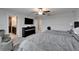 Bedroom showcases large dresser and doorway to the ensuite bathroom at 16685 Parker River St, Wimauma, FL 33598