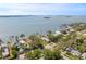 Waterfront homes with private docks and beautiful views of the bay and the city skyline beyond at 1748 Sunset Dr, Clearwater, FL 33755