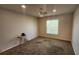 Bedroom featuring a ceiling fan, window, and comfortable carpet at 2113 E Del Webb Blvd, Sun City Center, FL 33573