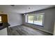 Dining area with large window providing ample natural light and neighborhood views at 2113 E Del Webb Blvd, Sun City Center, FL 33573