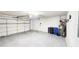 Spacious two car garage with ample space for parking and storage at 2113 E Del Webb Blvd, Sun City Center, FL 33573