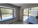 Bright room with bench seating and sliding glass doors at 2113 E Del Webb Blvd, Sun City Center, FL 33573