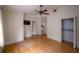 Empty bedroom featuring hardwood floors, a closet, ceiling fan, and neutral paint at 2305 S Hesperides St, Tampa, FL 33629