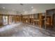 Living room featuring exposed interior framing for remodeling with open floorplan at 2305 S Hesperides St, Tampa, FL 33629