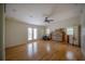 Bright, open living room with hardwood floors and door to a balcony at 2305 S Hesperides St, Tampa, FL 33629
