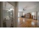 Spacious living room featuring gleaming hardwood floors and an attached bathroom at 2305 S Hesperides St, Tampa, FL 33629